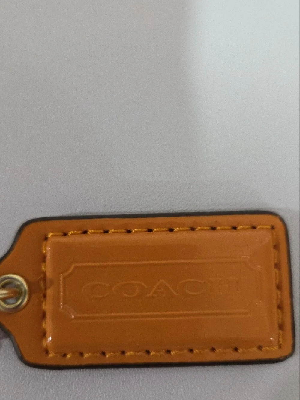 Coach leather tag